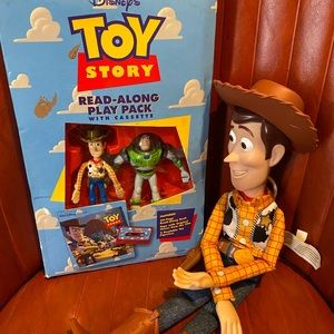Toy Story book , cassette and little figurines. Also Woody that talks
